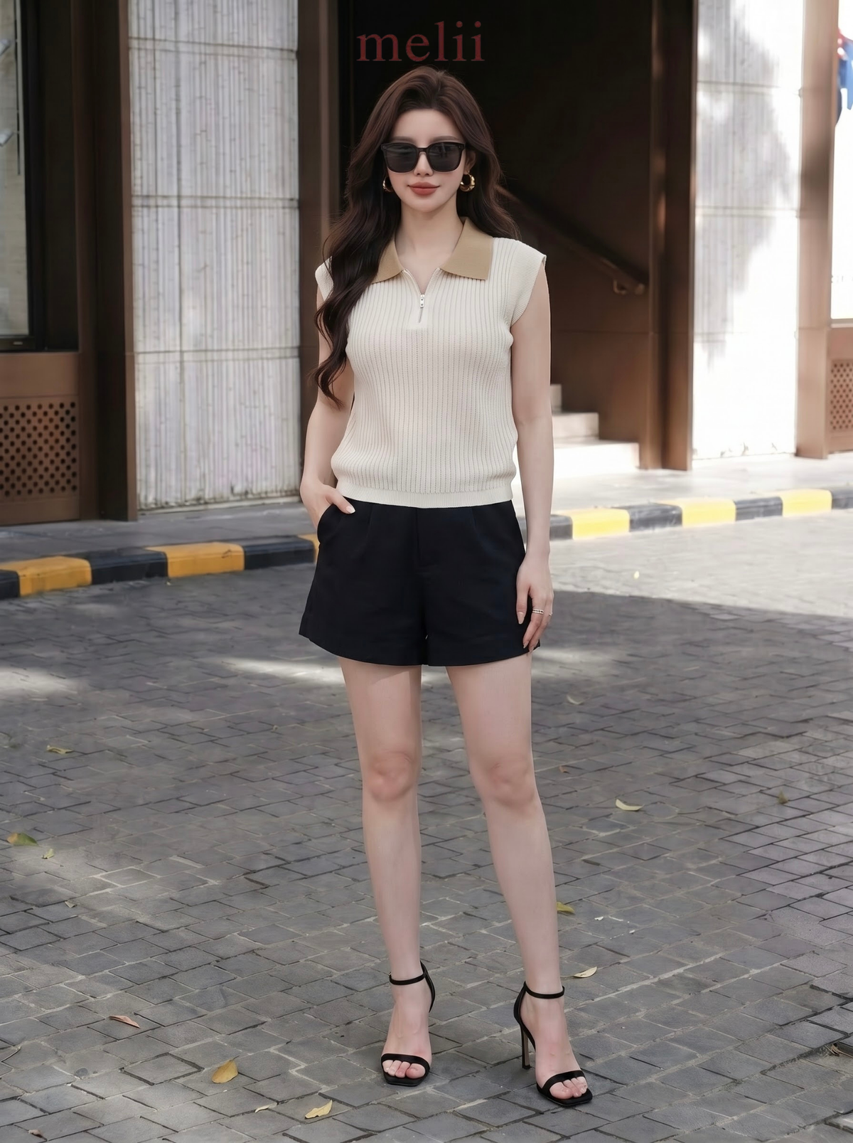 MELII ivory and sand contrast-collar knit top with zip neckline, lifestyle front view