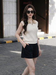 MELII ivory and sand contrast-collar knit top with zip neckline, closer lifestyle view