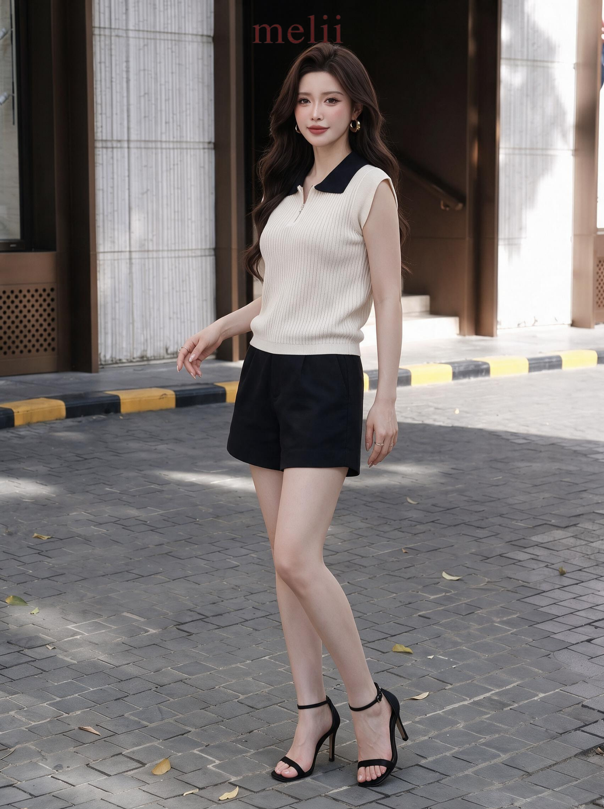 MELII ivory and black contrast-collar knit top with zip neckline, lifestyle side view