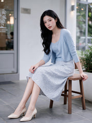 Adeline Three-Piece Cardigan Set in Powder Blue, seated café view