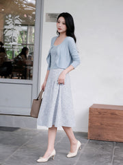 Adeline Three-Piece Cardigan Set in Powder Blue, angled café view