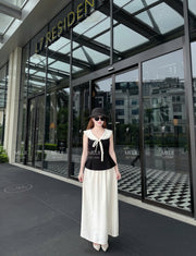 Elodie Sailor-Tie Top and Flowing Maxi Skirt Set in Noir and Ivory, real model hero view