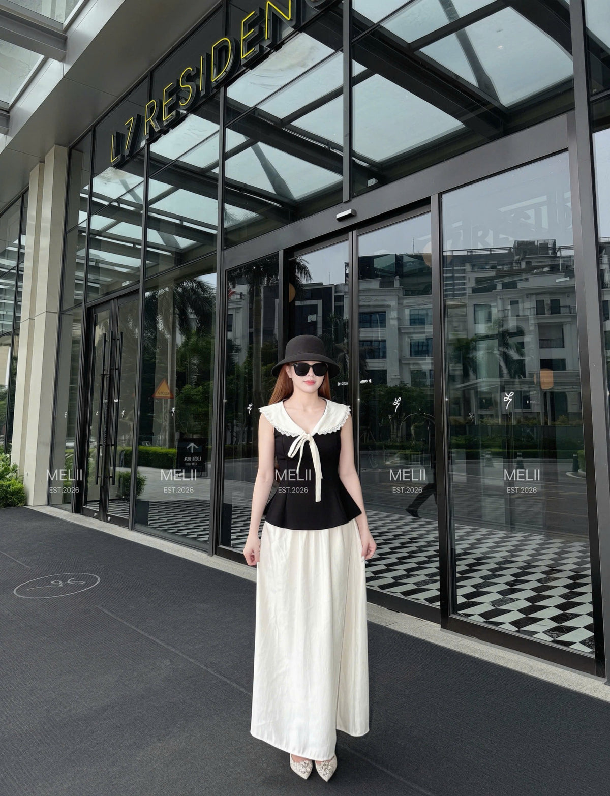 Elodie Sailor-Tie Top and Flowing Maxi Skirt Set in Noir and Ivory, real model hero view