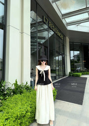 Elodie Sailor-Tie Top and Flowing Maxi Skirt Set in Noir and Ivory, third real model view