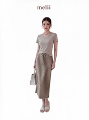 MELII Mira V-Neck Drawstring Top and Striped Maxi Skirt Set in Beige, full-length front model view on a white background