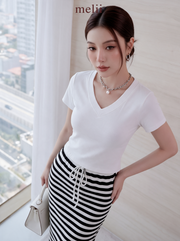 Mira White V-Neck Top and Striped Maxi Skirt Set, neckline and drawstring detail on model