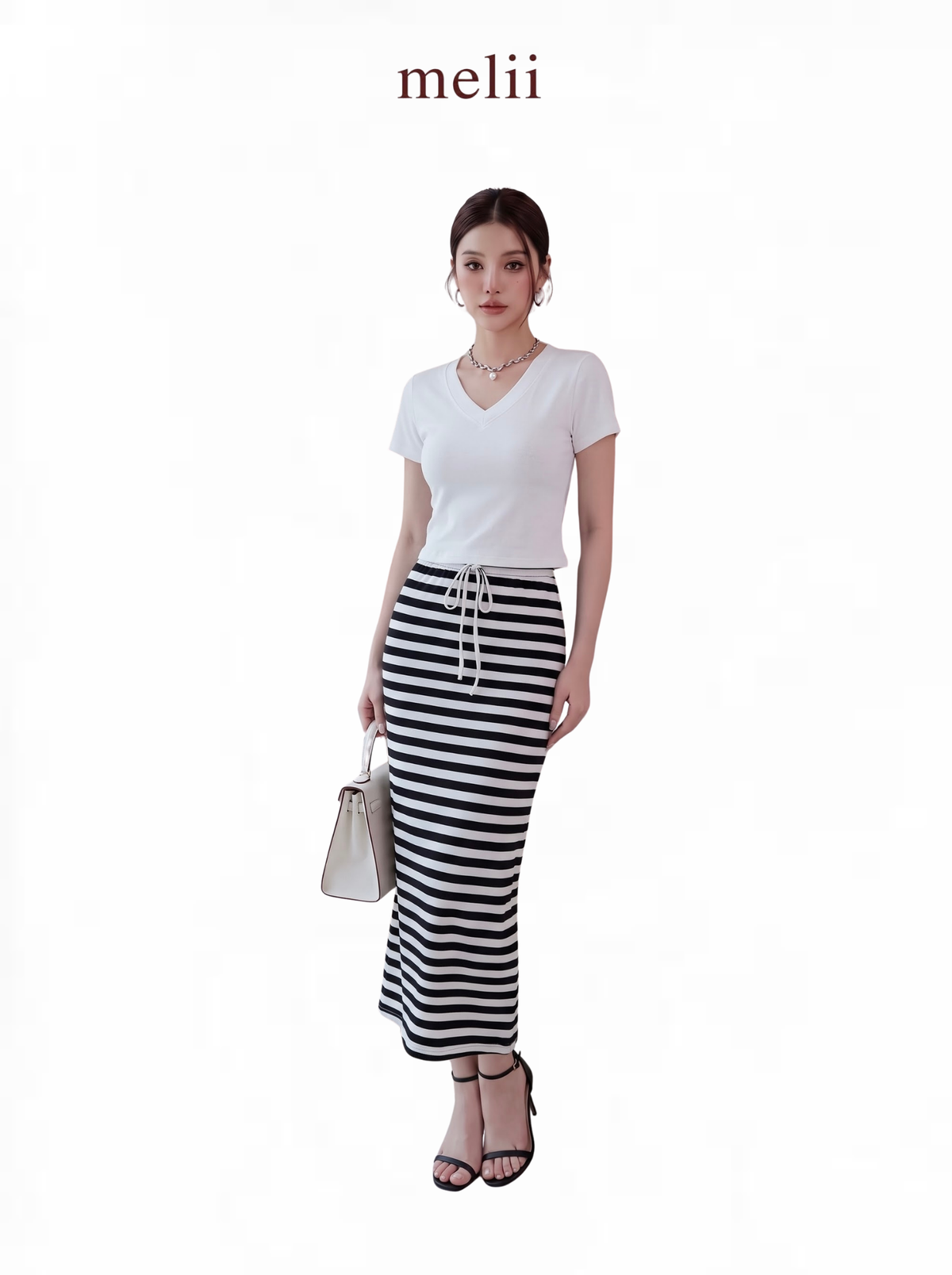 MELII Mira White V-Neck Top and Striped Maxi Skirt Set, full-length model view on a white background