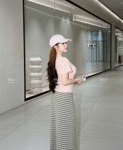 Mira Drawstring V-Neck Top and Striped Maxi Skirt Set in Blush Pink, side model view