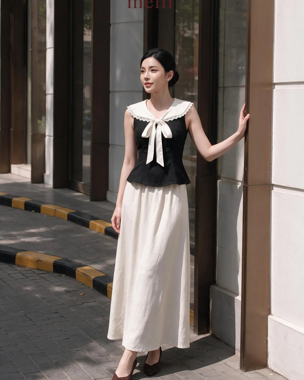 MELII campaign look in black and ivory